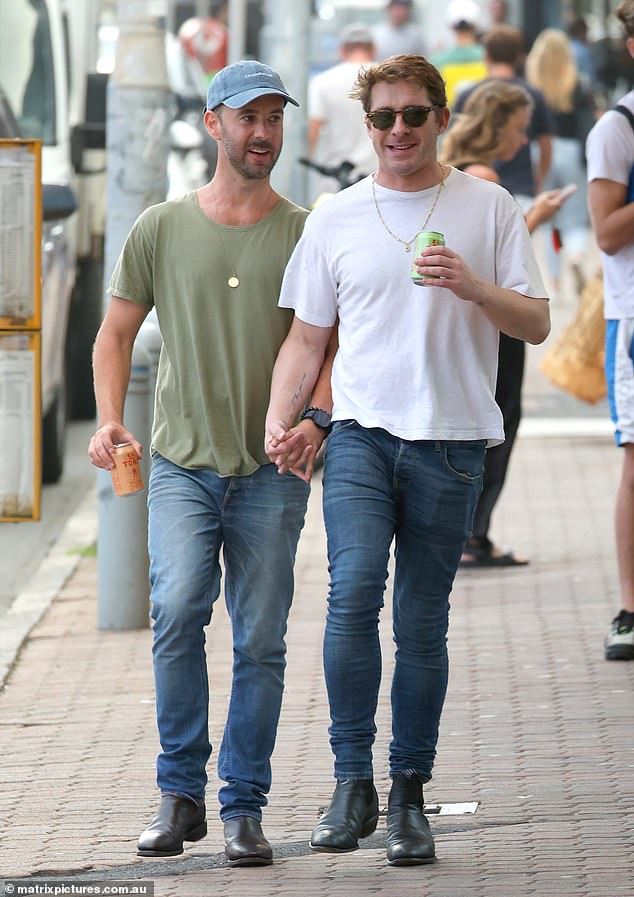 The veteran actor, 37, seemed to have a spring in his step as he happily strolled down Campbell Parade, a famous alcohol-free zone.