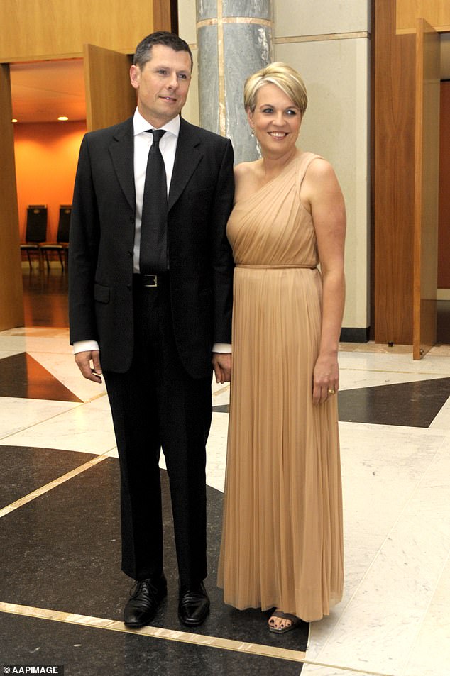 Tanya Plibersek (right) pictured with her husband Michael Coutts-Trotter (left).  Plibersek comes under fire for comment she made about Peter Dutton's appearance