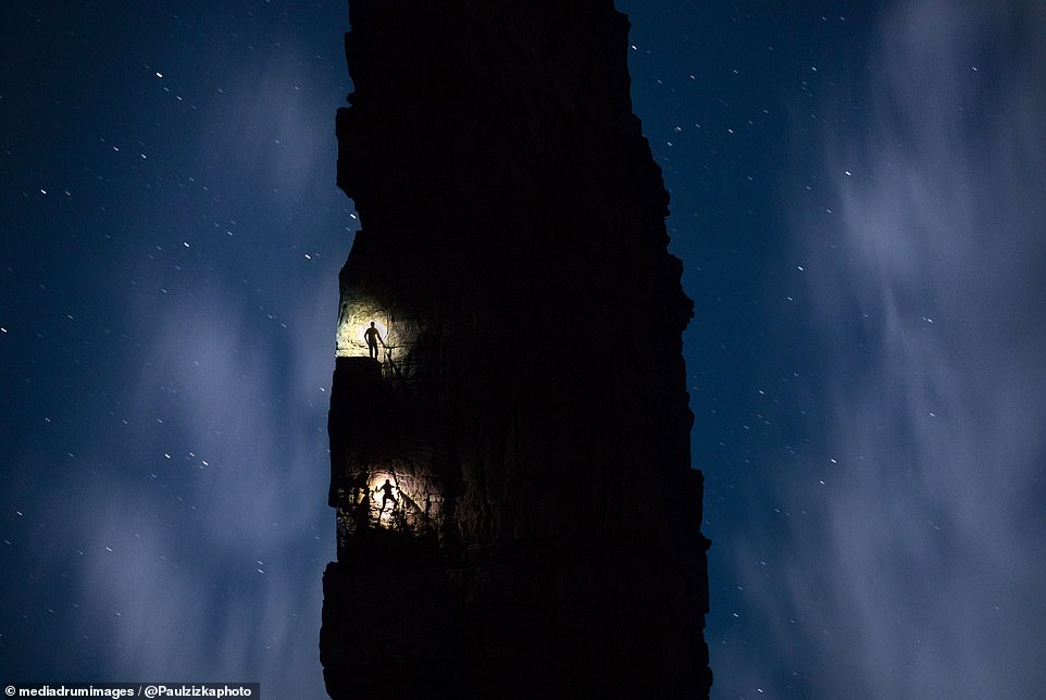 1707738987 44 Mesmerizing images capture daredevil climbers hanging from ice caves and