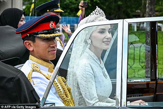 Photos show the couple taking part in a public wedding ceremony under an opulent pergola, before heading inside the palace for a formal blessing.