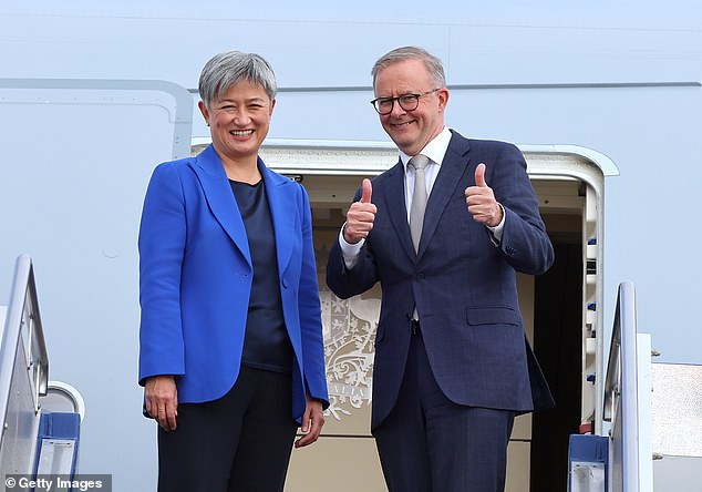 Albanese is seen with Foreign Minister Penny Wong after arriving in Japan for the QUAD leaders meeting
