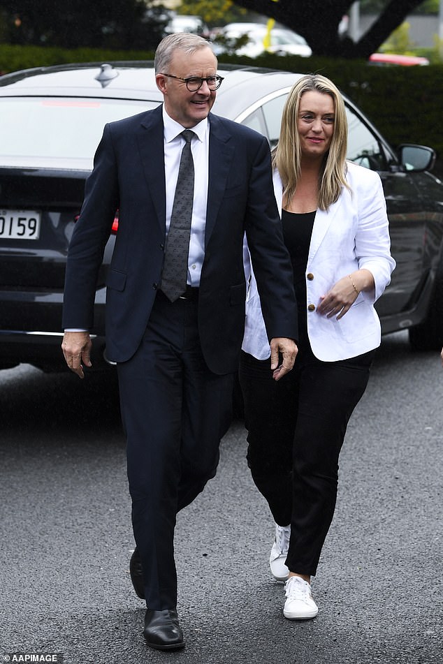 Albanese is seen with his partner Jodie Haydon (above)