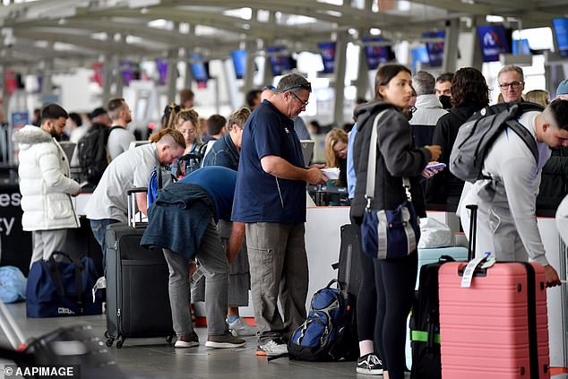 The widespread chaos was caused by just two workers calling in sick. In the photo, Sydney airport.