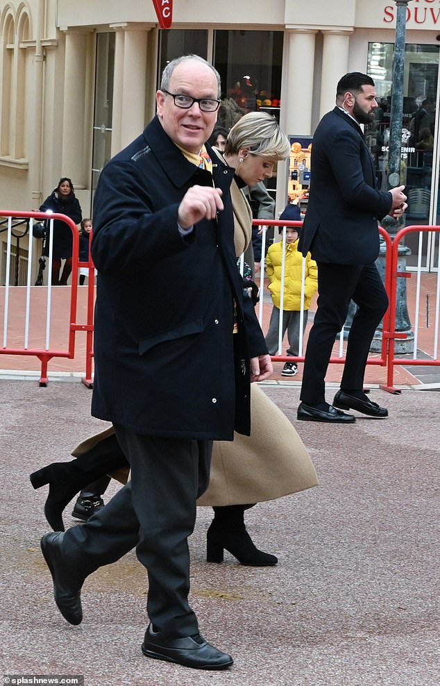 Prince Albert appeared in high spirits as he waved to crowds on the streets of Monaco on Saturday.