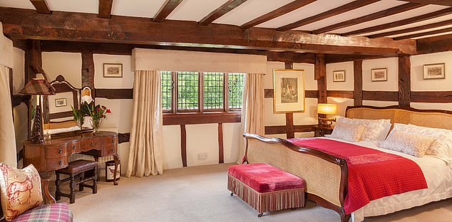 King-size beds, wooden beams, and luxurious decor adorn each room