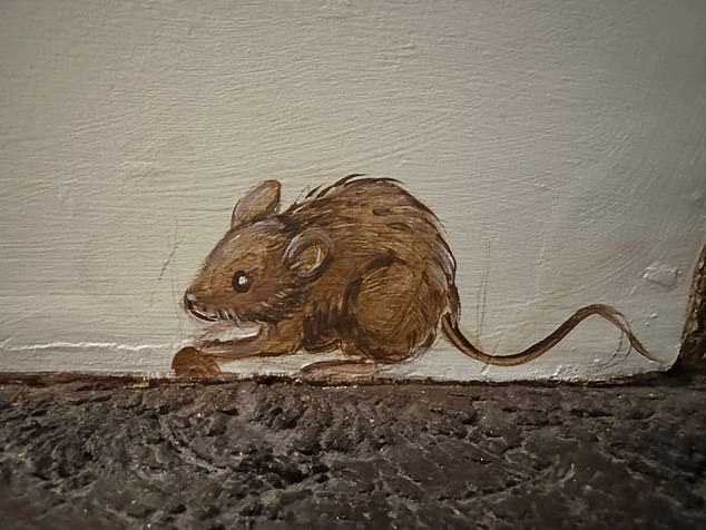 One of the little mice painted on the walls - the kids love finding them all.