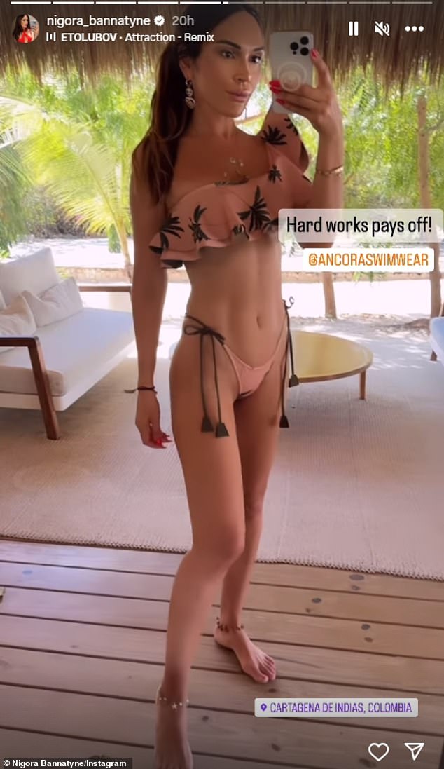 On her Instagram Story, Nigora donned a tiny pink bikini that featured a ruffled one-shoulder top and tie side pants as she posed for a mirror selfie.