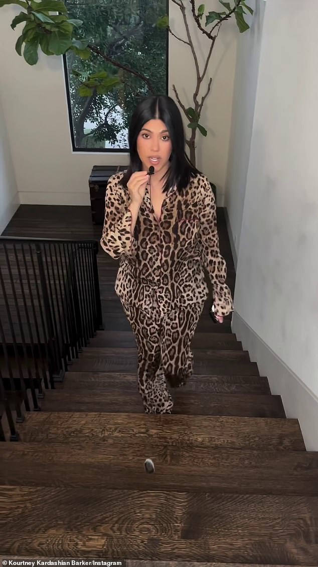 Kardashian appeared to have filmed the announcement inside her $8.5 million, six-bedroom mansion within the Estates at the Oaks gated community before flying to Australia to be with her neighbor-turned-husband, Travis Barker.