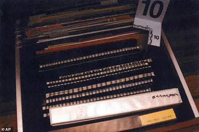 According to the report, Zwonitzer deleted his recordings with the president after learning of the Justice Department's investigation into Biden's mishandling of classified documents, but officials were able to recover most of them with forensic tools (pictured: evidence photographs).