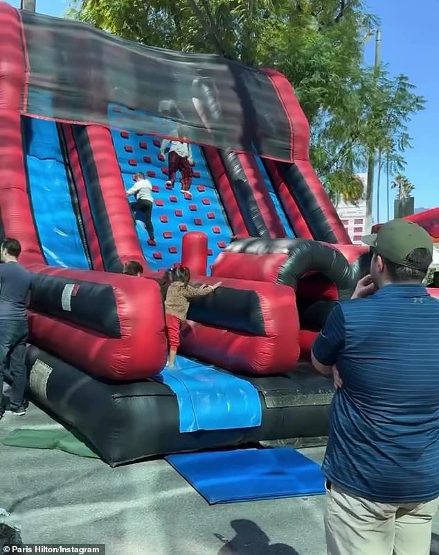 Paris shared a video of several inflatable slides that many of the children seemed to enjoy playing on.