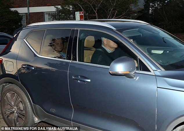 The former prime minister is seen driving with his family as they prepare to move out of Kirribilli House.