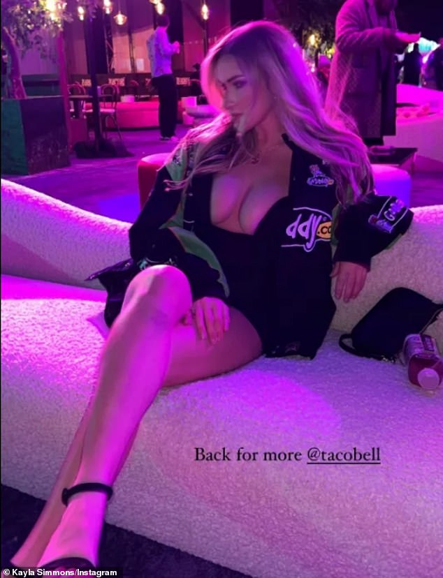 The athlete turned OnlyFans model flaunted her physique while rocking a black mini dress with a plunging neckline.