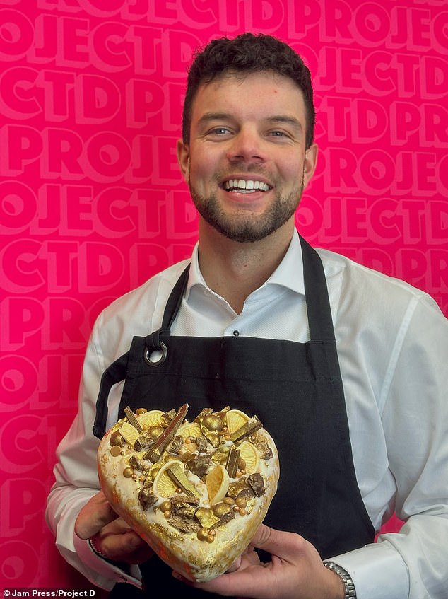 Matt Bond, creative director of Project D, holding the golden heart-shaped donut