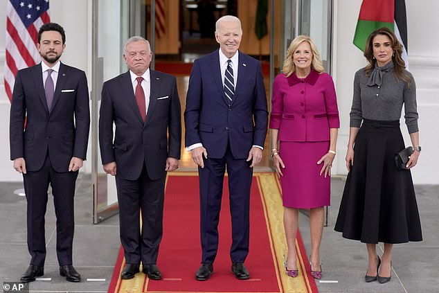 President Joe Biden, center, and first lady Jill Biden, second right, pose for a photo as they greet King Abdullah II of Jordan, second left, Queen Rania, right, and Crown Prince Hussein, left, on the North Portico of the White House.
