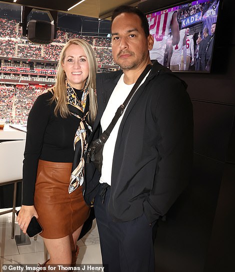 Henry brought his firm's executives to the game, including TJH Law vice presidents Laurie Dobson, Ruben Herrera.
