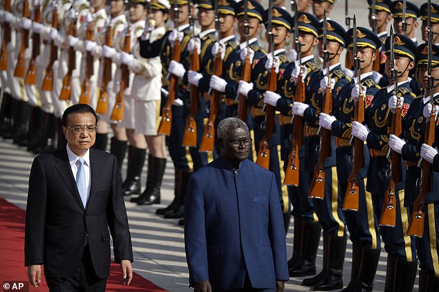 A new security agreement between China and the Solomon Islands will be formally signed later this week (left: Chinese Premier Li Keqiang, right: Solomon Islands Prime Minister Manasseh Sogavare)