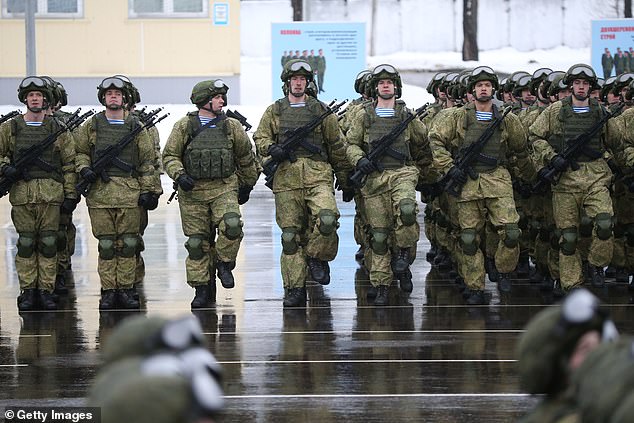 A Russian-Canadian citizen has admitted planning to violate US sanctions by exporting $7 million in weapons to the Russian military. (Pictured: Russian paratroopers march during the military parade at the 76th Guards Air Assault Division in Pskov, Russia, March 1, 2020)