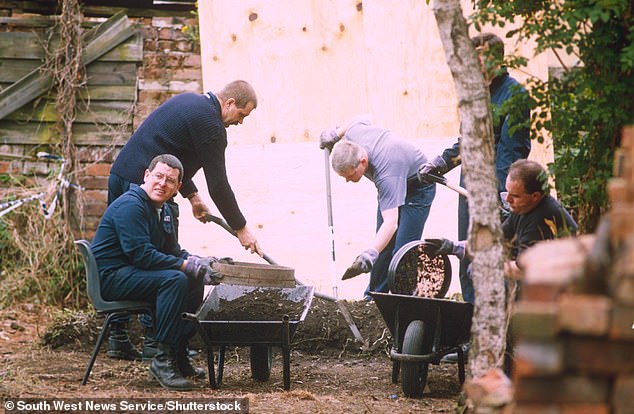 Police excavate the garden at 25 Cromwell Street in Gloucester where the bodies were found in 1994.