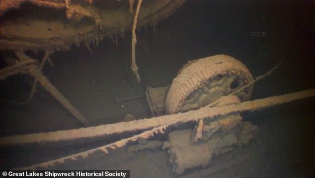 Cloudy underwater images show the ship partially upright