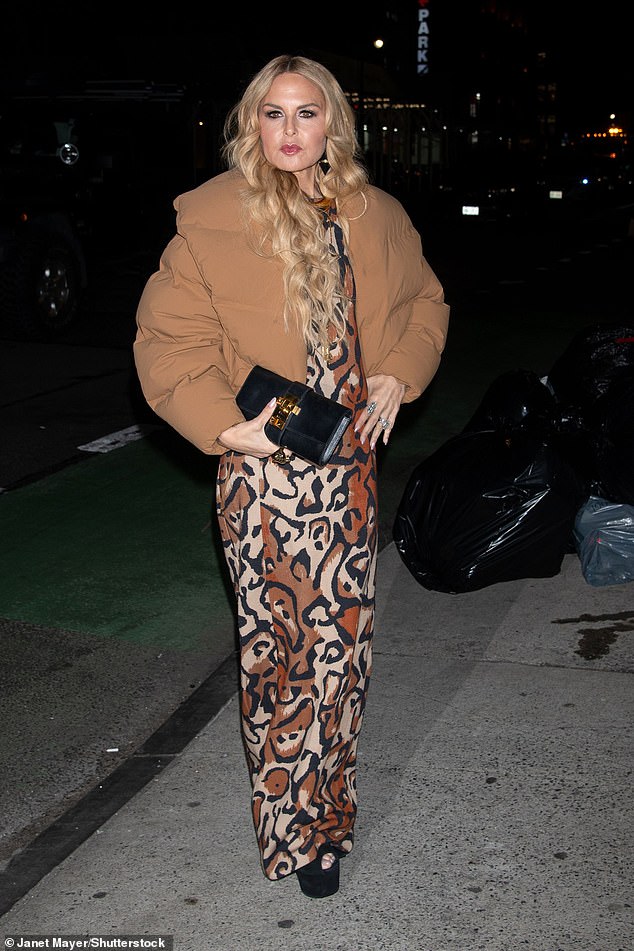 Rachel Zoe stood out in a brown, beige and black animal print dress, along with a more casual brown puffer jacket.