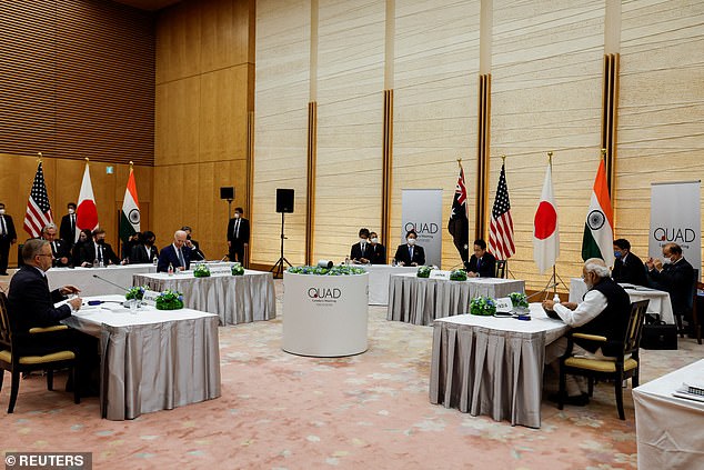 The four leaders gave speeches during the Tokyo summit on Tuesday.