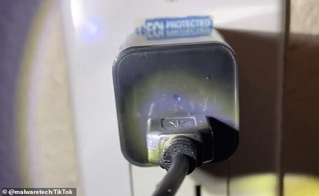 Small light on an electrical outlet reveals the presence of a camera