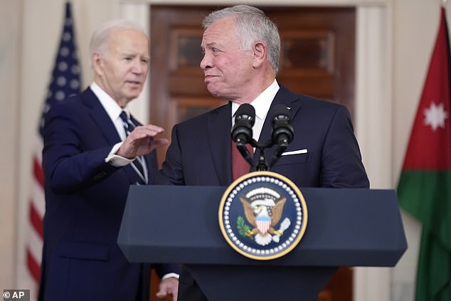 After ceding the podium to King Abdullah of Jordan, Biden wandered behind the monarch in search of his marker