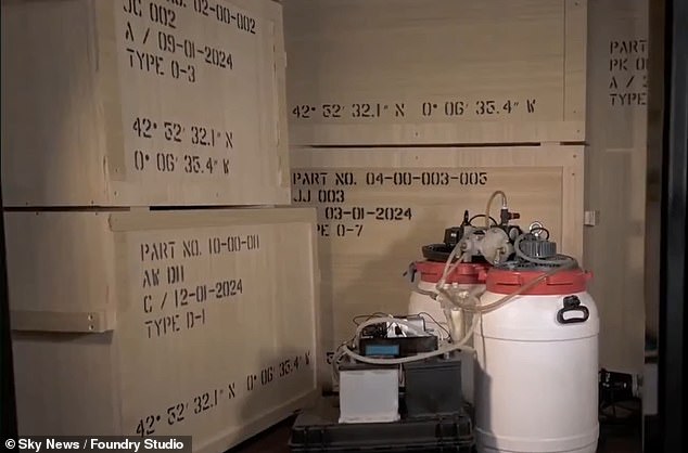 Inside the dungeon, two white barrels have been photographed next to the boxes that supposedly contain the works of art.