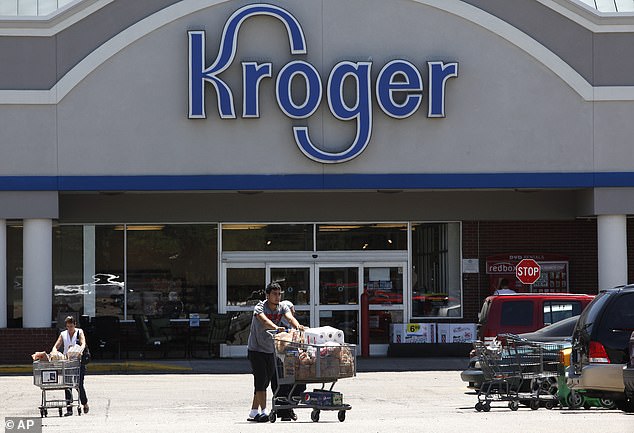 The CPI index for food at home is the one that increases the most in a year. Pictured are shoppers outside a Kroger in Dearborn, Michigan.
