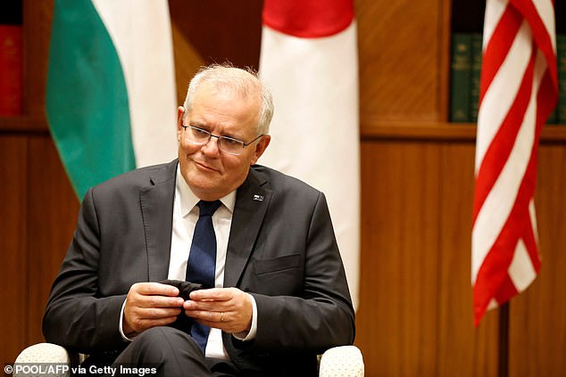 A former Australian diplomat writing for a Chinese government-controlled news agency attacked Scott Morrison as 