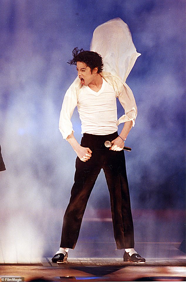 Michael Jackson is pictured during his iconic 1995 performance at the MTV Video Music Awards (pictured)