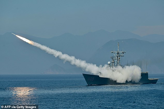 The Taiwanese navy launches a US-made Standard missile from a frigate during the annual Han Kuang drill.