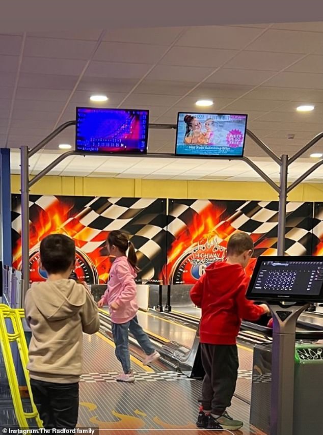 Some of the children went to the bowling alley to enjoy a fun game during the family vacation.