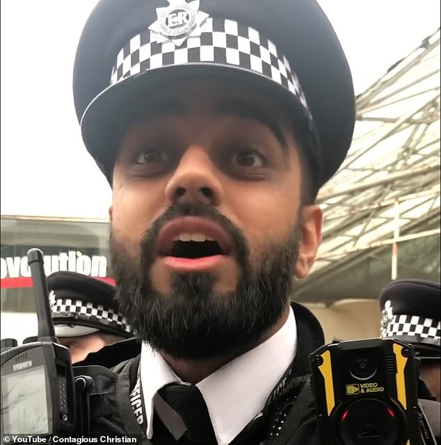 A second officer explains that a citizen called the police for homophobic comments