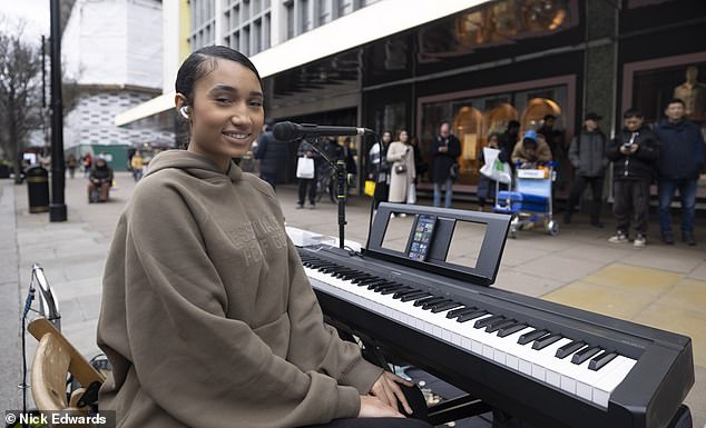 Harmonie London, 20 (pictured), had been singing outside the John Lewis flagship store in London on Sunday when she was approached by volunteer police officer Maya Hadzhipetkova.