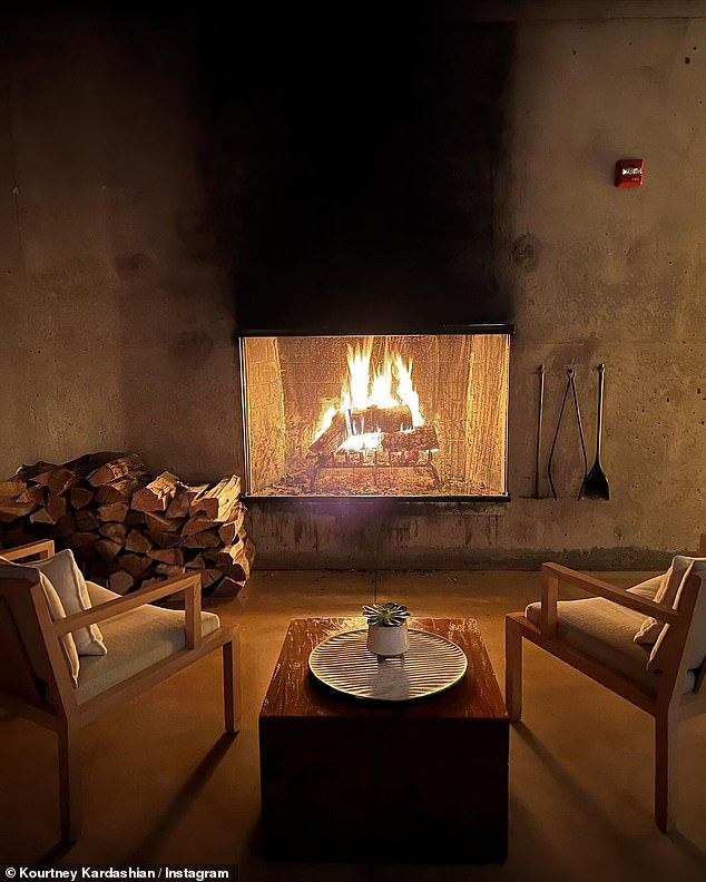 She contrasted the cold images with a photo of her suite's crackling fireplace and stacks of firewood.