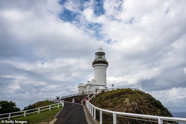 Shocking images showed several vehicles abandoned on the road outside the public car park by tourists desperate to see the sunrise at the famous Cape Byron lighthouse (pictured).