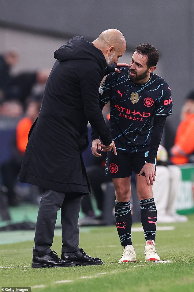 Guardiola speaks to Silva after he limped off with an ankle injury on Tuesday night.