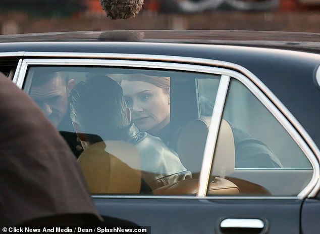 Bloom and her co-star Howard were seen talking to a third actor through a car window.
