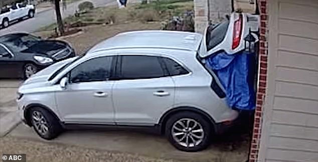 Moreno backed his car near the garage and hung a tarp that blocks the view of everything entering or leaving the vehicle.