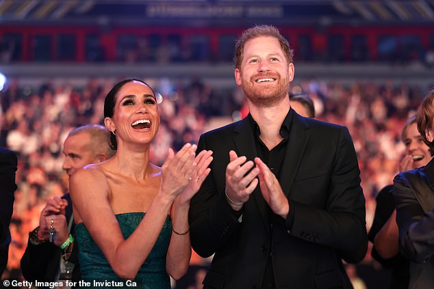 Prince Harry, Duke of Sussex, and Meghan, Duchess of Sussex, attend the closing ceremony of the Invictus Games in September 2023. The photo now appears on the home page of sussex.com
