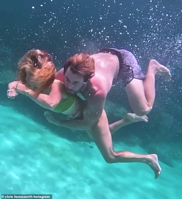 The Thor star took to Instagram with a very racy video of himself grabbing Elsa, 47, as they swam underwater together.