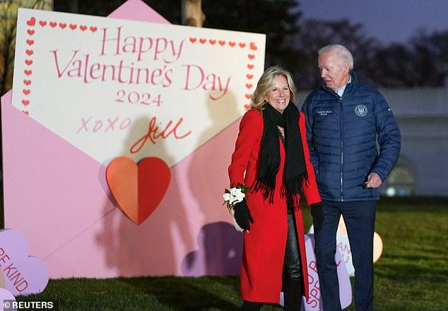 First lady Jill Biden (left) and President Joe Biden (right) walked to the North Lawn Wednesday evening to view the White House Valentine's Day decorations.