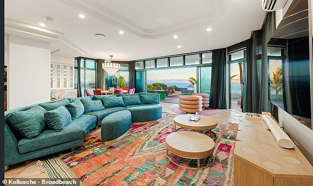 Located in the coastal suburb of Mermaid Beach, the sprawling four-bedroom, four-bathroom, two-level pad covers a double block and boasts incredible water views.