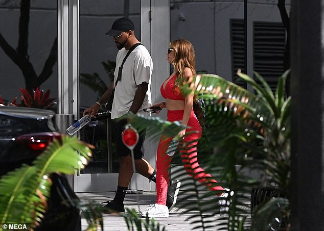 The Real Housewives Of Miami star showed off her toned figure wearing a red sports bra and matching leggings for the daytime outing.