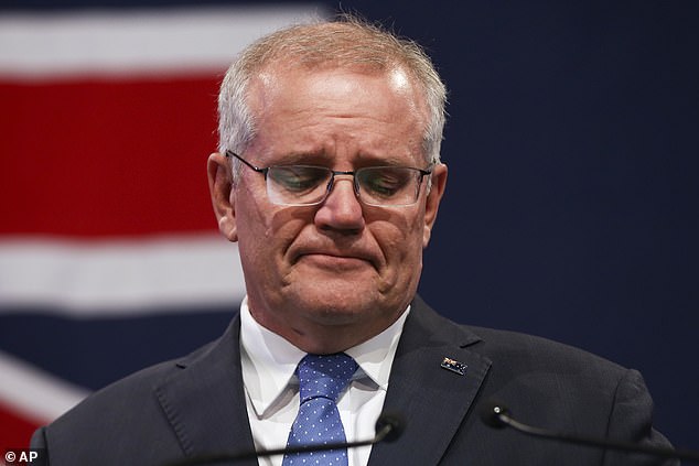 Loss: Morrison is pictured after election defeat at a Liberal Party function in Sydney on Saturday.