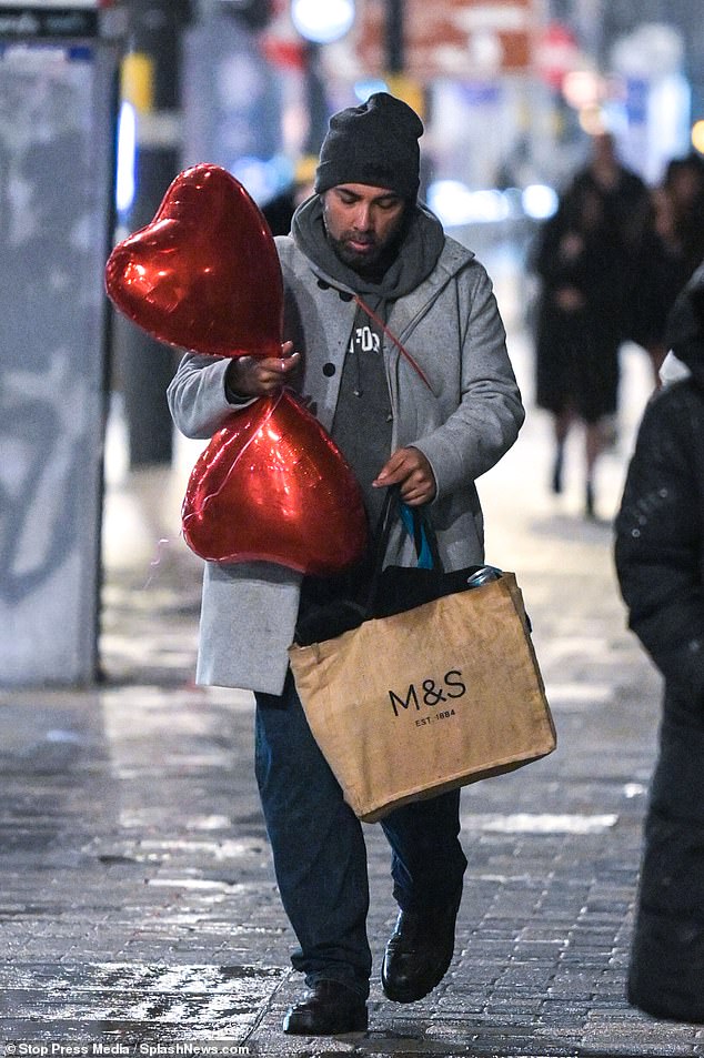 Another clutched red balloons and a bag of M&S goodies as he headed home to his loved one.