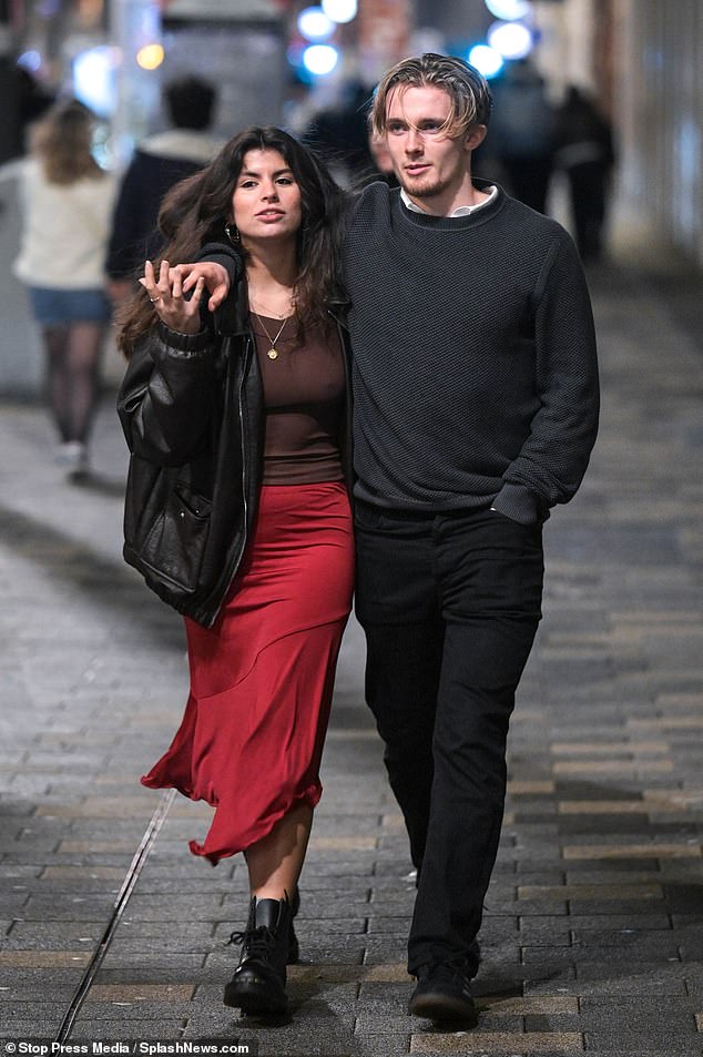 A lookalike of Posh and Becks were spotted holding hands while out and about in Birmingham