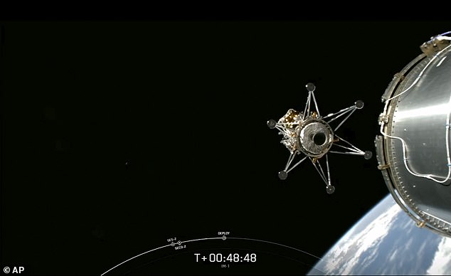 This image from a video provided by SpaceX via NASA TV shows the Intuitive Machines lunar lander separating from the rocket's upper stage and heading toward the moon.
