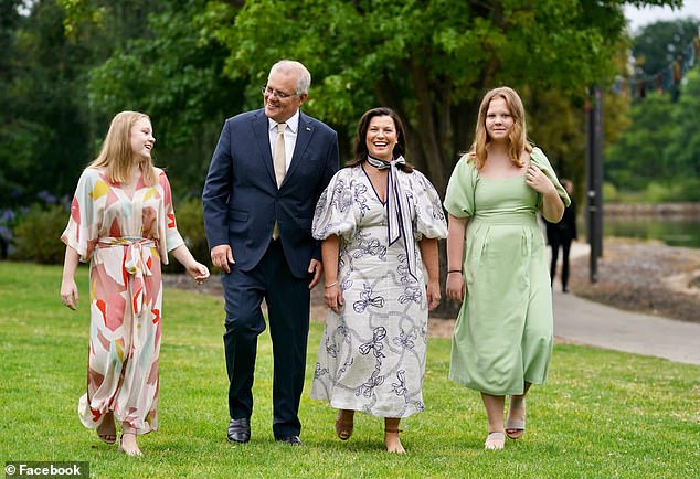 The Morrison family, pictured left to right: Abbey, Scott, Jenny and Lily.  A cruel Twitter troll described the children and their mother's way of dressing as 'Amish'.